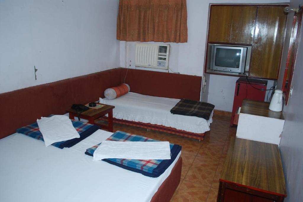 Charans Guest House Λάκναου Δωμάτιο φωτογραφία